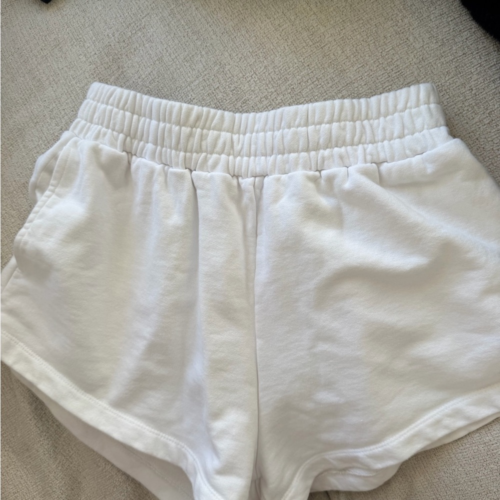 Daily Drills White Athletic Elastic-Waist Shorts with Green Logo Patch - Picture 2 of 2